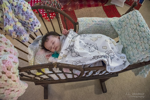 Penelope (our first granchild) in our Antique Cradle