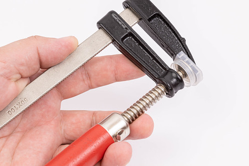 Woodworking Clamp in the hand above white background