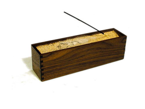 First incense casket: burning stick in decorative sand