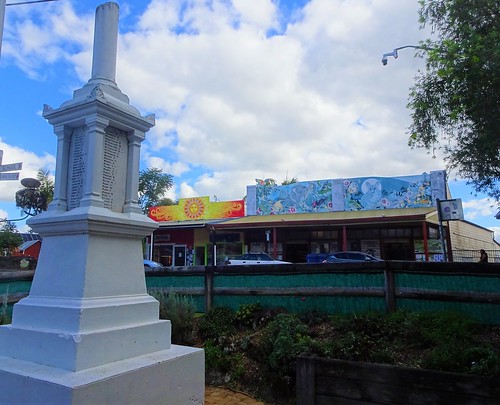 Nimbin. The 1970s hippy capital of Australia. The War Memorial and colourful stores across the street. . .