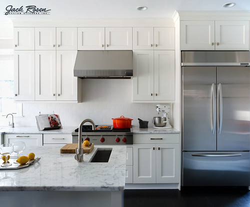 Jack Rosen Custom Kitchens - High contrast black & white kitchen with chrome highlights