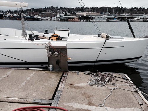 Ballard WA - CSR Corporation - sloop FRANCIS LEE - Striping the hull