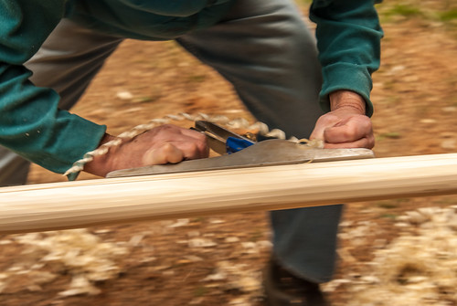 Man Planing Wood