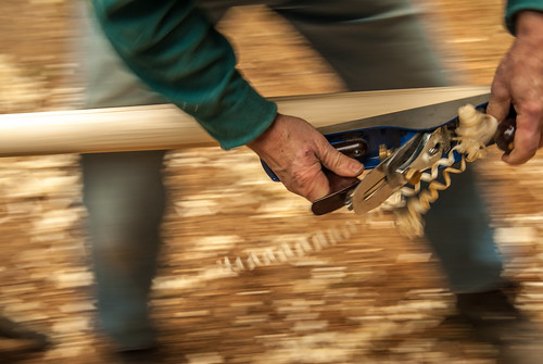 Man Planing Wood