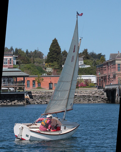 IMG_7563CE - Port Townsend Bay - PTYC Opening Day - aboard BLUE STAR - Port Townsend Pocket Yachter (PTPY)  member Simeon Baldwin with his SCAMP number 11 NODDY sails the waterfront