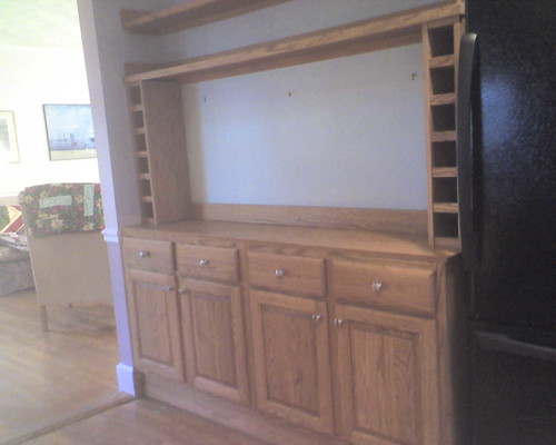 Narrow kitchen cabinets w/ wine racks