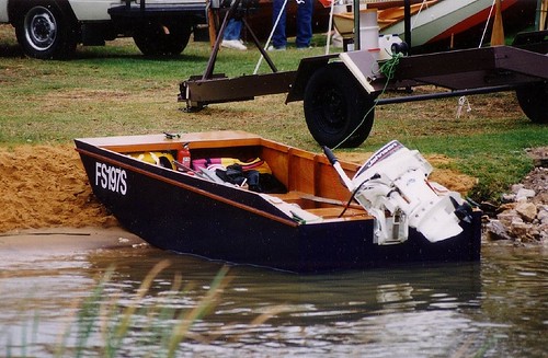 punt on shore of lake