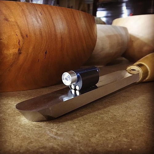 Tiny magnetic LED light, shown here stuck to my round-nose scraper. Does a great job illuminating the inside of bowls and hollow forms! For more details, see the most recent blog post on my website:  joewoodturner.com