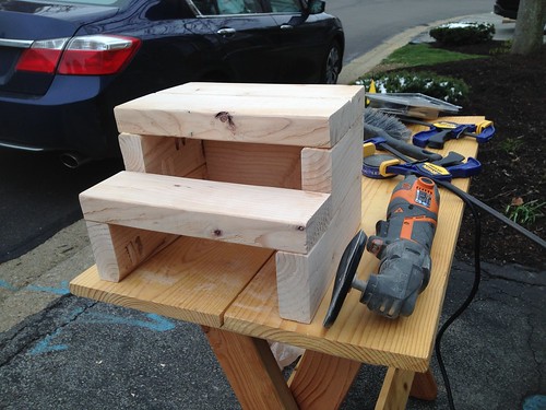 Sanding 2x4 step stool using multi-tool with sanding disc