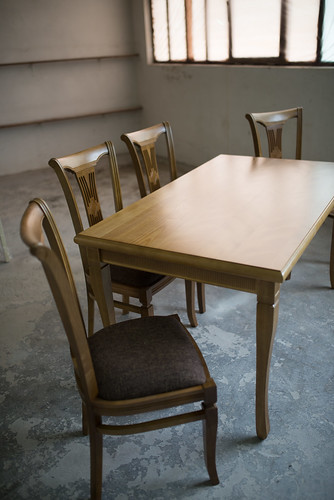 Chairs and table for kitchen in workshop.