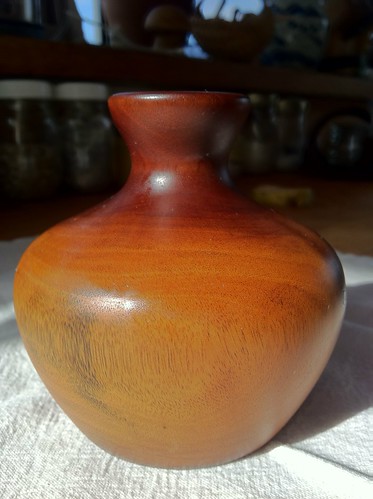 Turned mahogany bud vase, made from a weathered tree branch