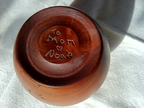 Turned mahogany bud vase, made from a weathered tree branch