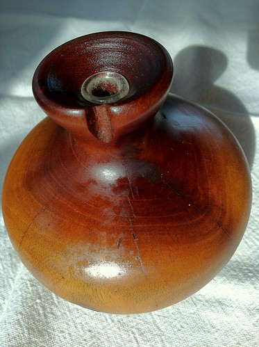 Turned mahogany bud vase, made from a weathered tree branch