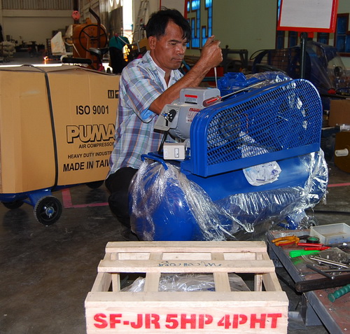 Buriram Hardware Store Technician Installs Mitsubishi Electric Motor on Puma Air Compressor