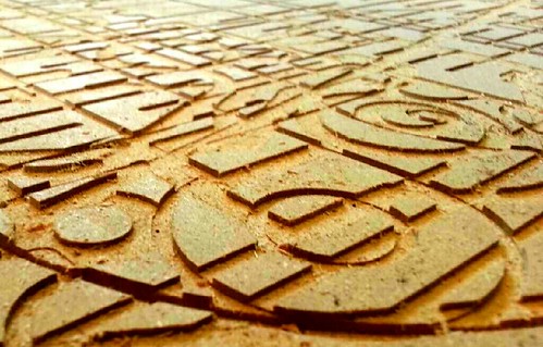 MDF board in the wood shop, with some H. R. Giger-ish patterns.