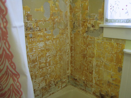 Tiles removed on the tub surround