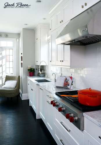 Jack Rosen Custom Kitchens - High contrast black & white kitchen with chrome highlights