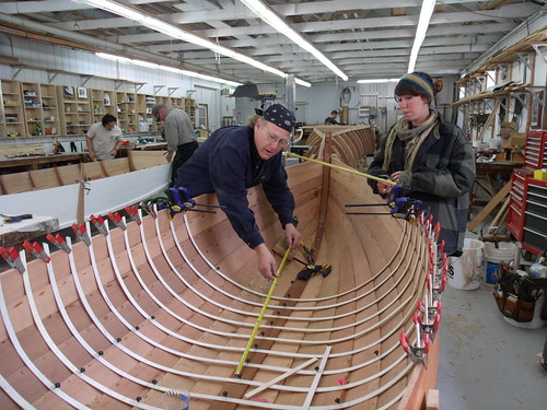 GEDC7689 - Northwest School of Wooden Boatbuilding - Traditional Small Craft - 9-foot Grandy skiff - lining out frame locations - student Russell Bates (L) and Caro Clark