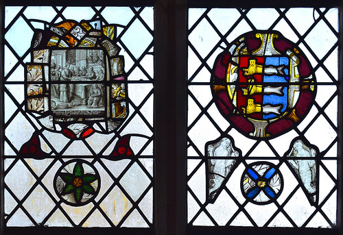 St Bridget feeds the poor (continental, 17th Century), arms of Great Yarmouth, two mermaids and a roundel