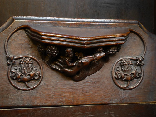 Hunter disembowling a Stag, Misericord, Manchester Cathedral