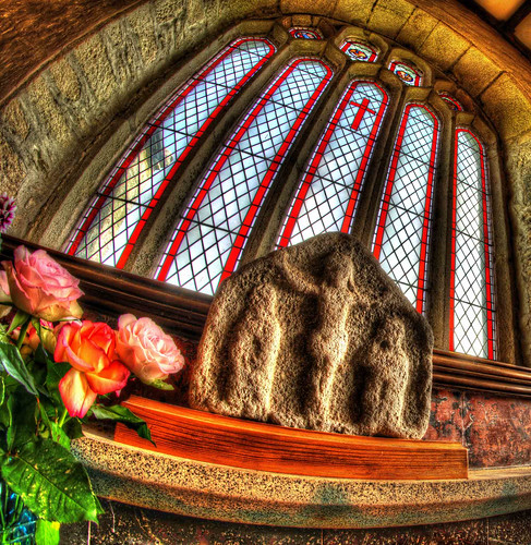 Ancient and simple Crucifixion scene behind the Alter