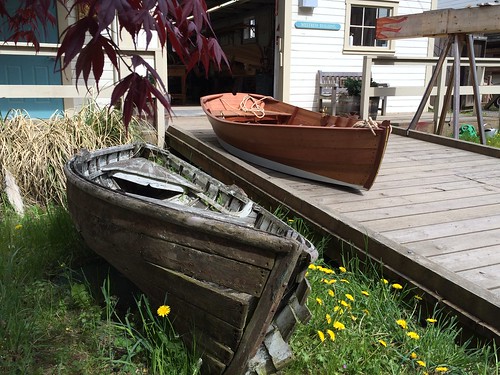 IMG_4856 - Port Hadlock WA - Northwest School of Wooden Boatbuilding - Traditional Small Craft -  outside Westrem Shop - 12-foot double-ended Davis Boat on grass, new Atkin Flipper dinghy on ramp